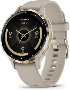 A close-up of the Garmin Venu 3S smartwatch with a gold steel bezel and French gray case, displaying a heart rate reading on its bright, colorful screen, worn on a wrist.
