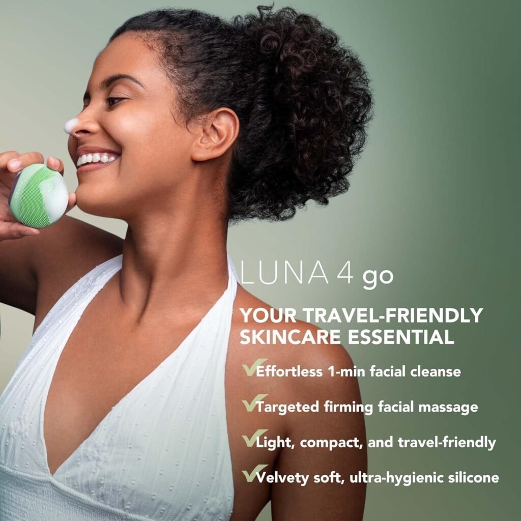 A close-up of the teal FOREO LUNA 4 Go facial cleansing and massaging device, held in a woman