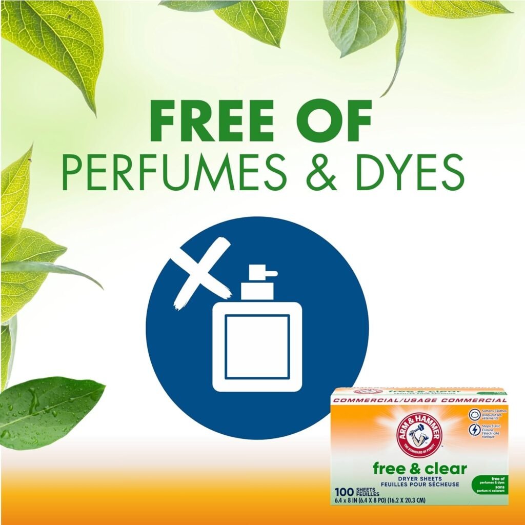 A box of Arm & Hammer Free & Clear Dryer Sheets is open on a clean laundry counter, with a single sheet draped over freshly folded white towels.
