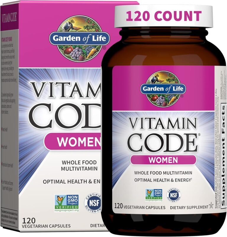 Garden of Life Vitamin Code Women's Multivitamin – Raw Whole Food, Organic & Non-GMO A bottle of Garden of Life Vitamin Code Women multivitamin capsules placed next to fresh organic fruits and vegetables like spinach, berries, and apples on a wooden surface.