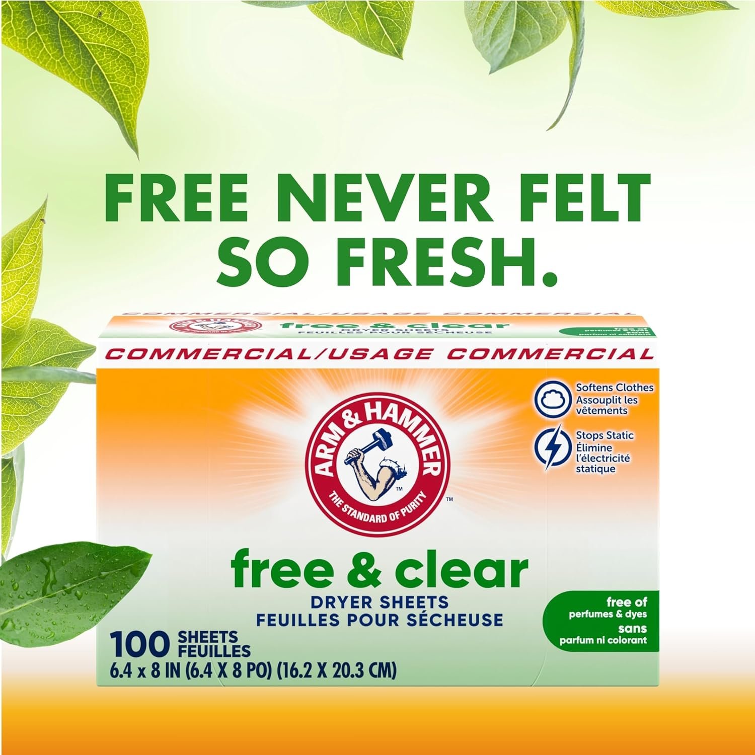 A box of Arm & Hammer Free & Clear Dryer Sheets open on a clean laundry counter, with a single sheet draped over freshly folded white towels.
