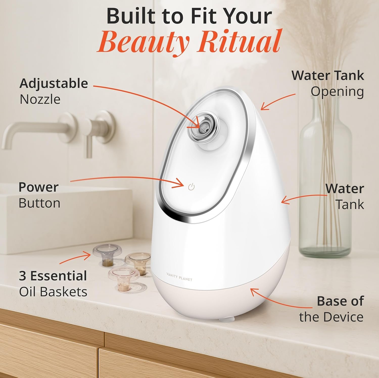A soft-beige Vanity Planet Aira Ionic Facial Steamer on a clean countertop, with a gentle mist rising from the adjustable nozzle, surrounded by a towel and skincare products.